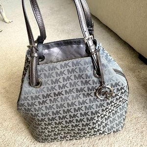 **SOLD**New w/ tags. Small stain on side.